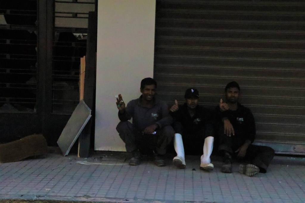 Migrant workers on a break. 